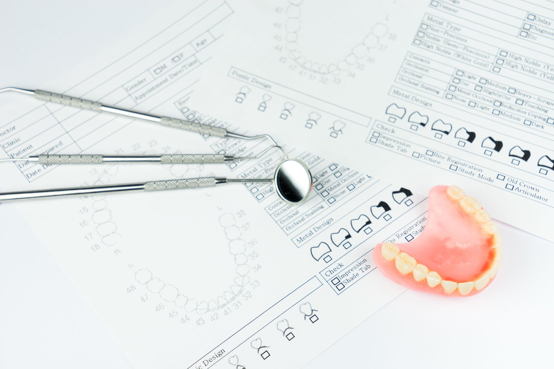 Denture, dental equipment tooth brush, toothpaste isolate on white background